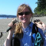 Wolf College coordinator Kim Chisholm collecting clams.