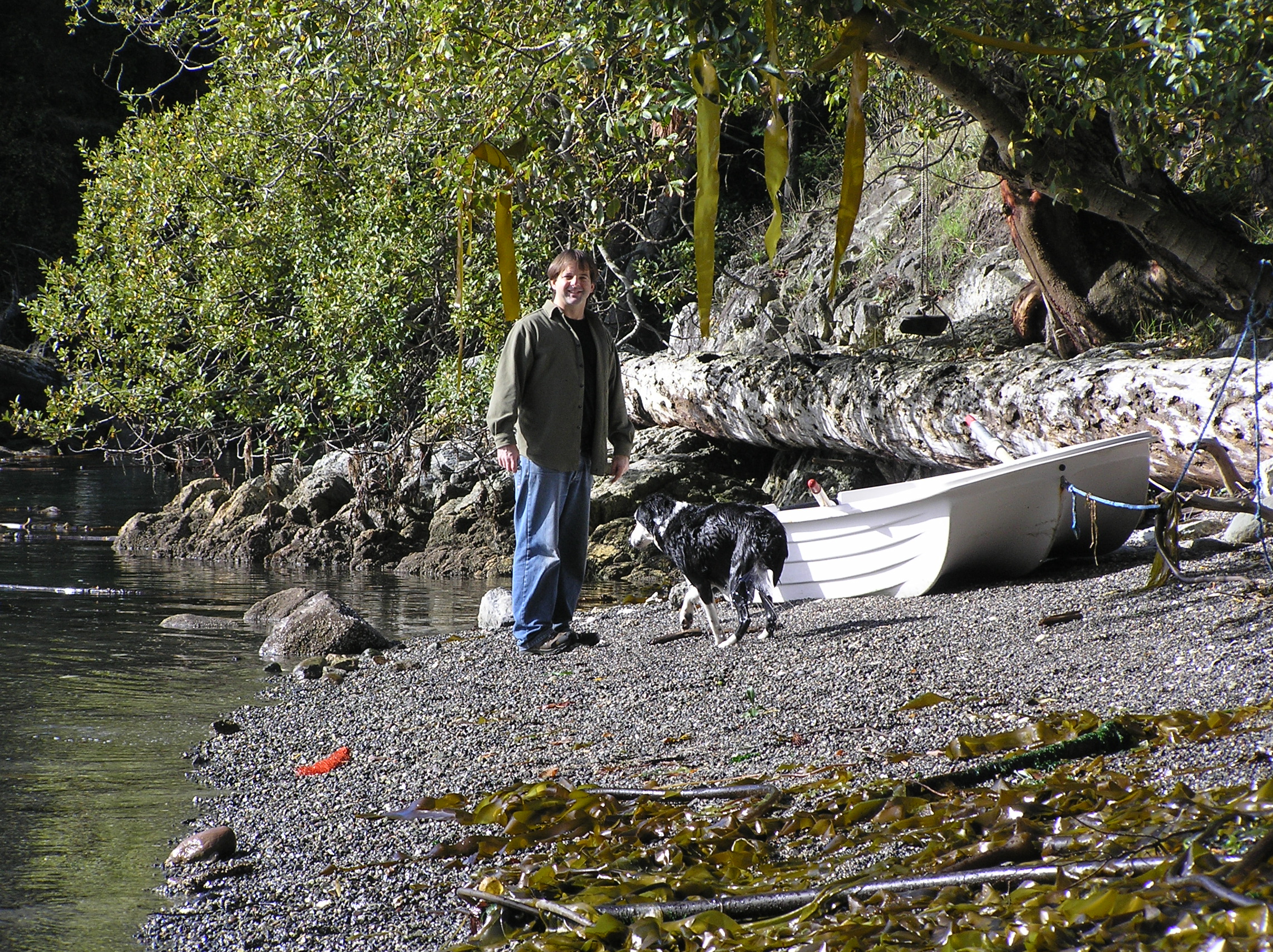 Wolf College founder drying Bullwhip Kelp on the beach at Orcas Island Wolf College founder drying Bullwhip Kelp on the beach at Orcas Island