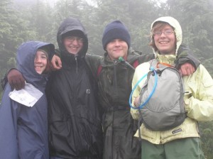 Four happy campers during our Alpine Trek backpacking adventure