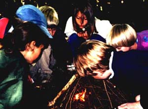 Wolf Campers starting a Tipi Fire to Roast Marshmellows Wolf Campers starting a Tipi Fire to Roast Marshmellows